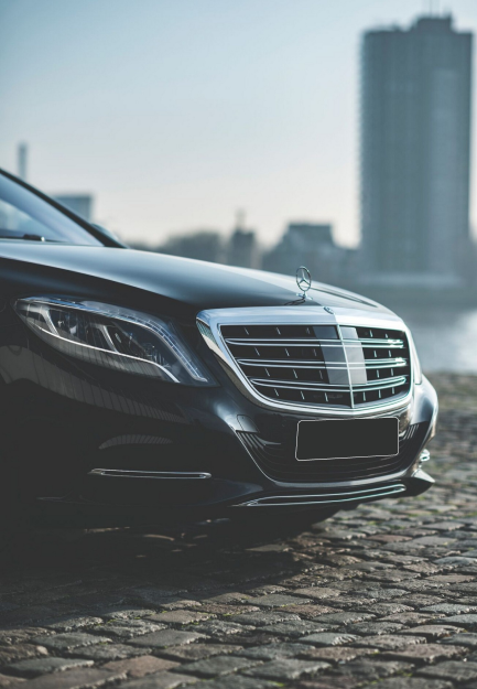 Two people signing an insurance document